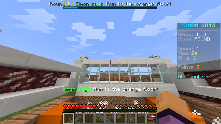 A round in progress with boss bar, action bar and scoreboard